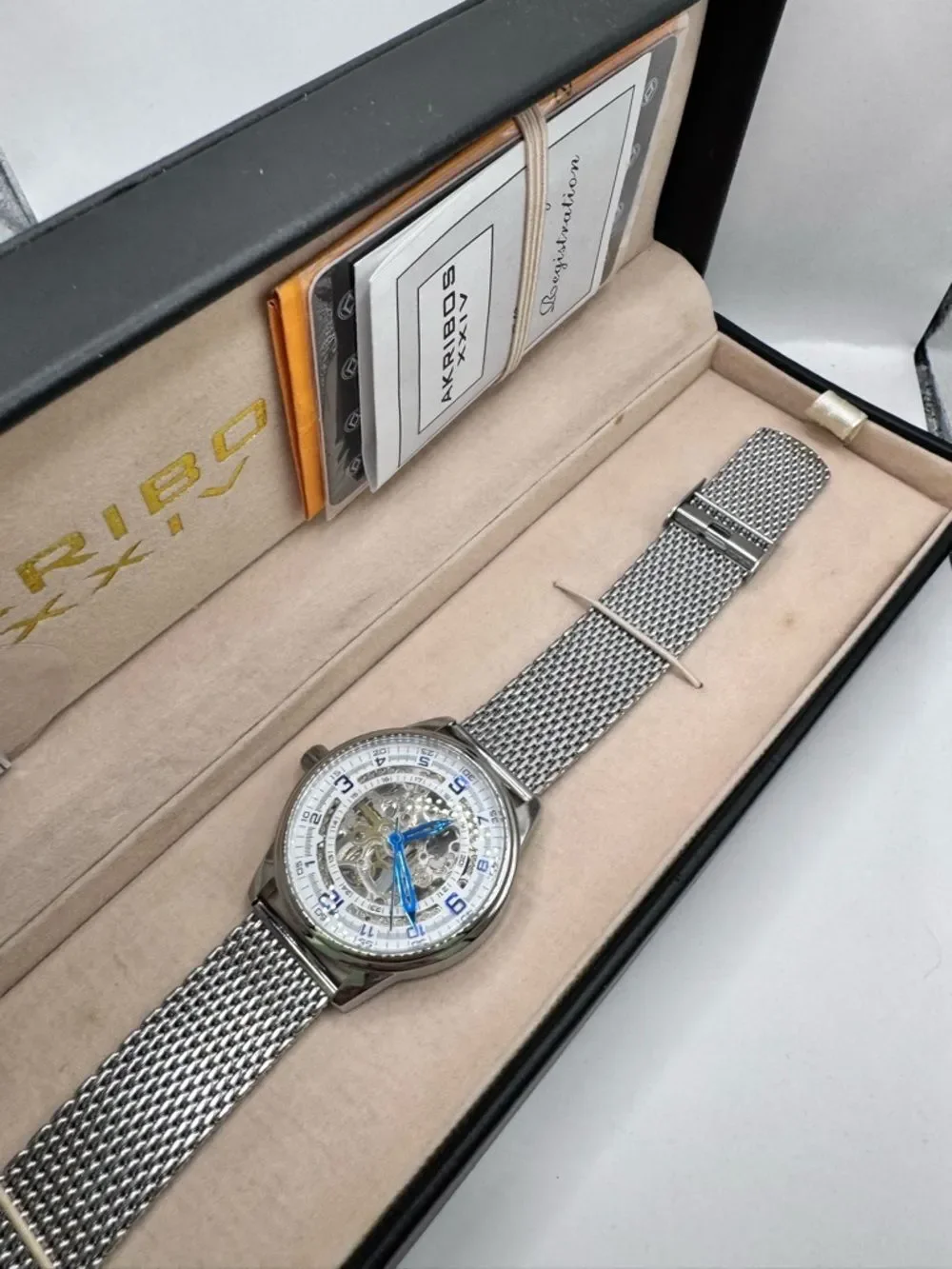 Akribos XXIV Men's Automatic Skeleton Watch Blue Hands Mesh Band New in Box